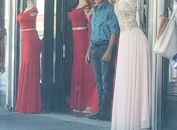 Lyzy's Fashion - Huntington Park, CA. They send him out to intimidate you as you walk to your car