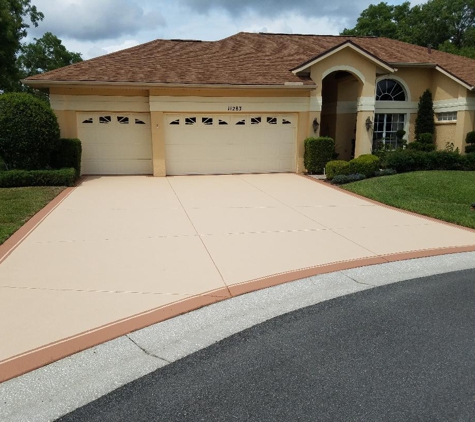 Ace Advanced Coating Experts - Weeki Wachee, FL. Concrete Stain Color Seal coating. Sandy Beach with Good Earth Border Band