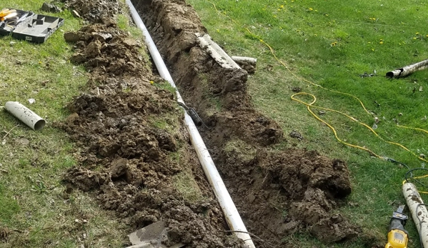 A Buckeye Rooter Service - Columbus, OH. outside yard drain repair.