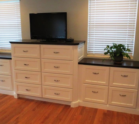 Borders Woodworks - Jacksonville, FL. Custom master suite built-m dresser in white