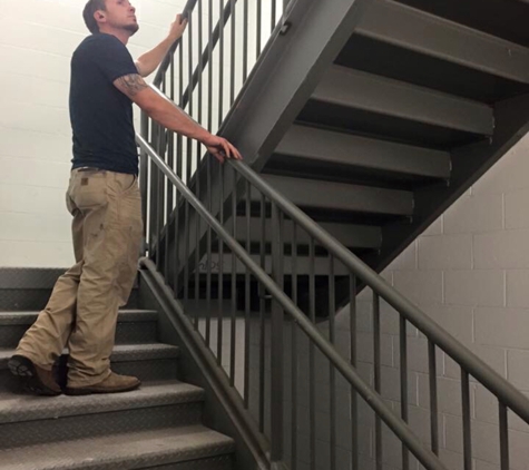 Smiths Mobile Welding. Iron Staircase railing install at U-Haul located in Southaven, MS 