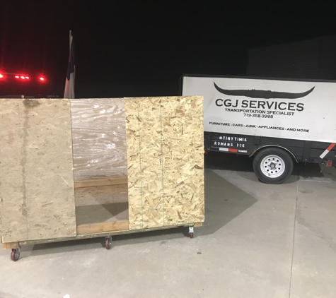 CGJ Services - Colorado Springs, CO. Delivering a trash container for a local business