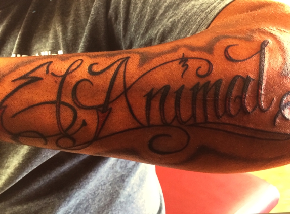 Iron Raven Tattoo Company - Palmetto, FL. Script tattoo done by Orlando!