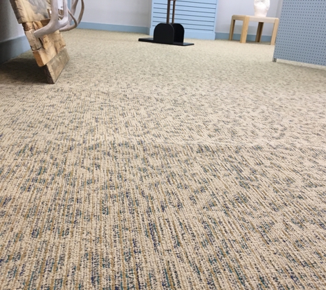 JP Carpet Service - Raton, NM. See the wrinkles - He won't fix this.