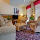 Country Club Inn & Suites - Lodging