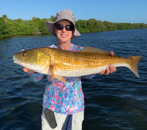 The Fisher Man - Deland, FL. 29" red fish caught in Tampa bay