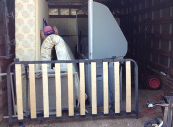 Go Green Recycling & Hauling - Jonesboro, GA. Large TV removal