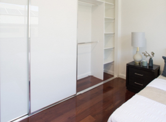 Bradnam's Windows & Doors - Urraween, QLD. Sliding Wardrobe Door In Bedroom