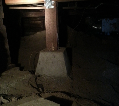 The Foundation Works - Burbank, CA. One of the new girders (with pier and post) they added to stabilize my floor.