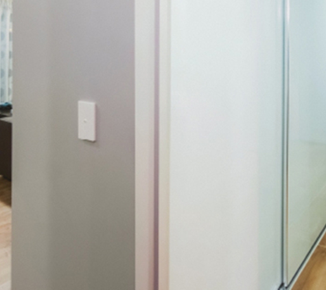 Bradnam's Windows & Doors - Gladstone Central, QLD. Sliding Wardrobe Door In Hallway