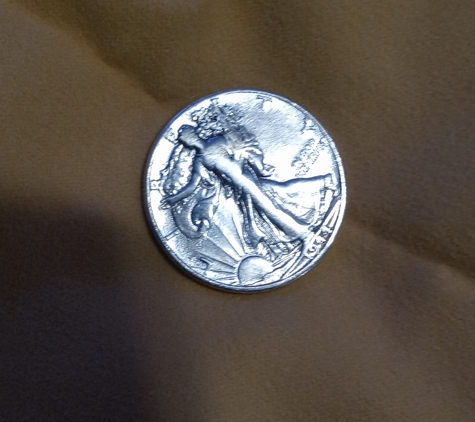 Fresno Coin Gallery Jewelry & Loan - Fresno, CA. 1944 silver half dollar