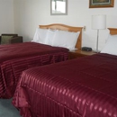 Oyster Bay Inn & Suites - Motels