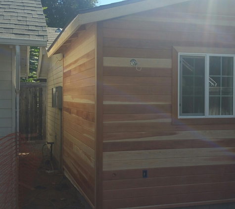 Garcia & Sons Construction Inc. - Modesto, CA. New redwood siding getting ready to paint