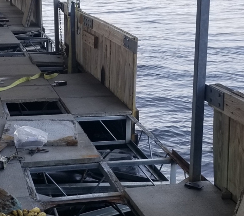 Lake of the Ozarks Dive Services LLC (LOZdive) - Osage Beach, MO. Dock company, disconnected breakwater wall to insert new frame, failed to re-attach wall correctly, result: wall fell off the dock