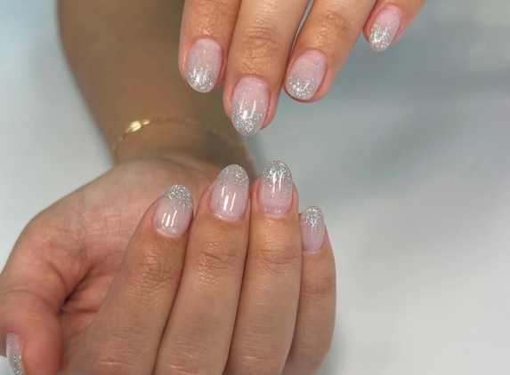 Angel's Nails and Beyond - Miami, FL. Gel manicure with silver sparkles design