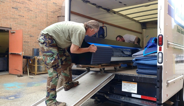 A.P.E. Movers - South Bend, IN. Nine and a half feet long over 356 pounds a copier machine for the school City