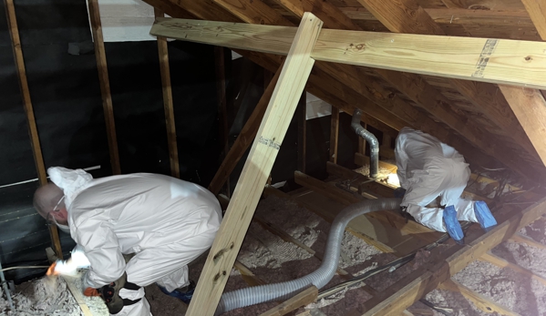 The Restoration Attics - Houston, TX. Removal of Contaminated Insulation