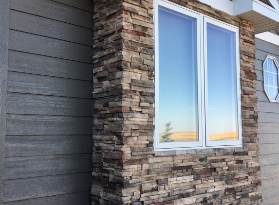 Dakota Builders - Rapid City, SD. Stone work done by Dakota Builders!  We have gotten so many compliments! We love our "new" home!!