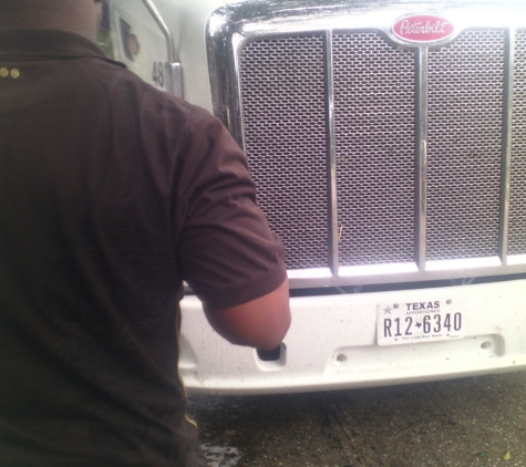 E&T Powerwashing and Landscaping Co - West Monroe, LA. Commercial vehicles being powerwashed