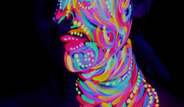 Paint 2 Smile. Blacklight face painting design by our owner and main artist Laura M Hoyos.