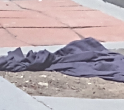 Tarry Motel - Sparks, NV. Walked by the other day and saw that now old dirty clothes are being left on the ground where people can see them walking by smh...