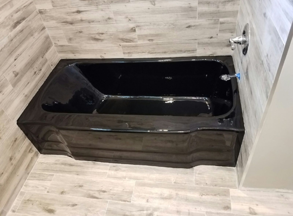 Bathtub Refinishing And Fiberglass Expert - Los Angeles, CA. My porcelain tub aster reglazed in black color by Bathtub Refinishing And Fiberglass Expert