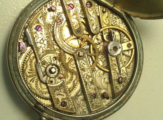 Duty's Watch and Clock Repair - Lost Creek, WV. old high grade swiss pocketwatch movement, unidentified but has engravings of the civil war on its silver case, likely 1800's