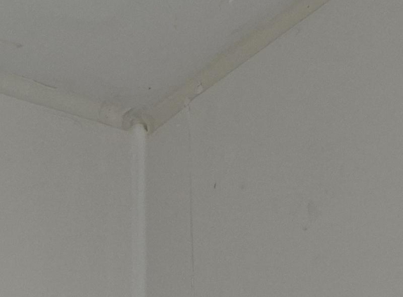 Advance Shower Repair and Bathroom Renovation - Taree, NSW. Tile was supposed to go up to ceiling, no cuts made, 3cm gap left to ceiling