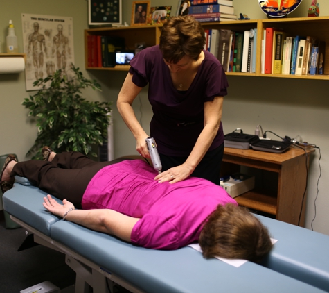 Rosenthal Chiropractic Clinic - Largo, FL. Spinal adjustment with the Impulse iQ