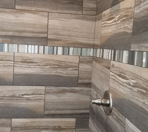 Isles Tile & Stone,  LLC - Punta Gorda, FL. My other shower they worked on. Again, such a happy person