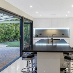 Bradnam's Windows & Doors - Emerald, QLD. Black Aluminium Bi-Fold Doors