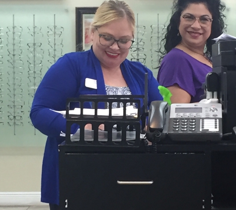 Eye Doctor's Optical Outlets - Sandlake - Orlando, FL. This is the manager Jennifer in the blue and her staff member.