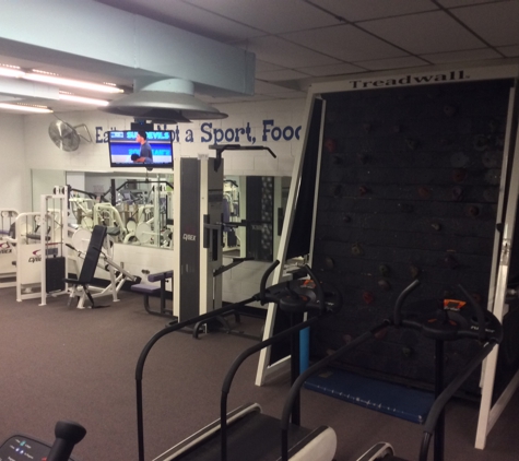 Athletes Choice Gym - Jacksonville, FL. Rock climbing and assisted pull up machine 