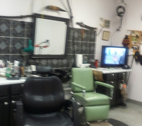 Bart's Barber Shop - Galesburg, IL. SEATS 100 PEOPLE,  2 AT A TIME