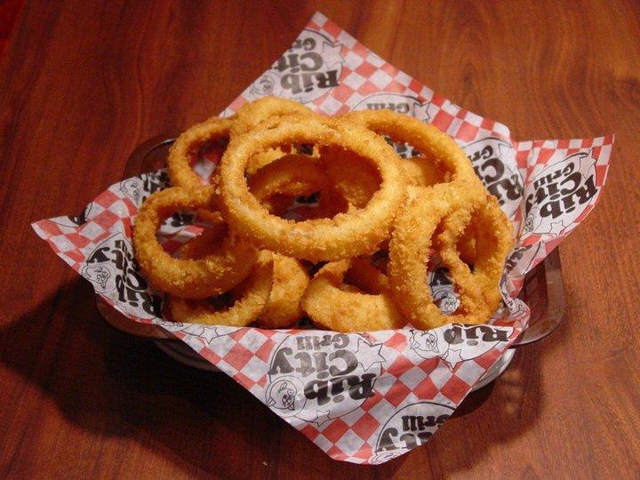 Order Crunchy Onion Rings food online from Rib City store, North Fort Myers on bringmethat.com