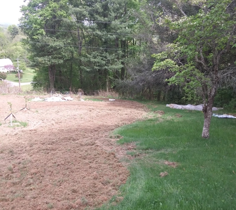 SimpleScape Contracting - Burnsville, NC. Permaculture Job with contouring