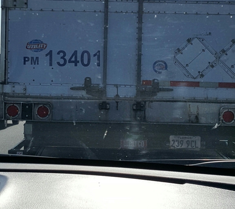 Caribe Trucking Express - Miami, FL. This is also the back of truck that erratically endangering others