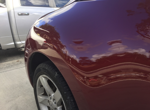 Five Star Dent Removal - Macomb, MI. Quarter panel dent After