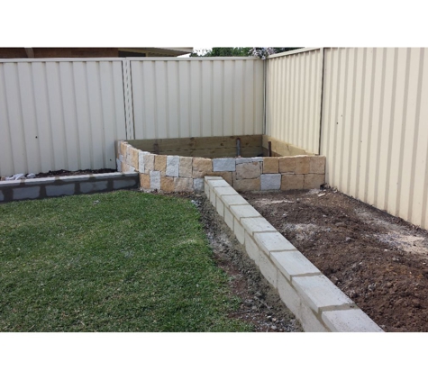 Pave The Way Landscaping - Tighes Hill, NSW. Sandstone garden bed