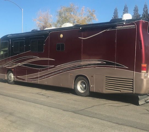 Bumpers Dents N Scratches - Sacramento, CA. I get all kinds of looks of WOW when folks see this.  Not too many red coaches on the road.