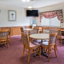 Days Inn & Suites by Wyndham Davenport East - Motels