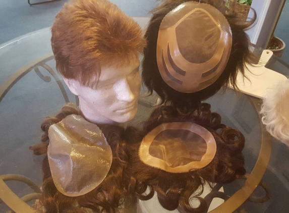 Gina's Salon & Wigs - Lakewood, OH. Men toupay  and top piece  available 
Start at $200. And up