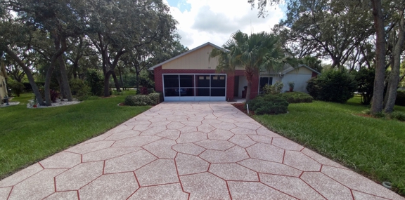 Ace Advanced Coating Experts - Weeki Wachee, FL. Modified Texture with Stone design to include cracks. Red Base with Buff & White